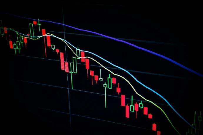 candlestick grafiek van de aandelenmarkt op een donkere achtergrond